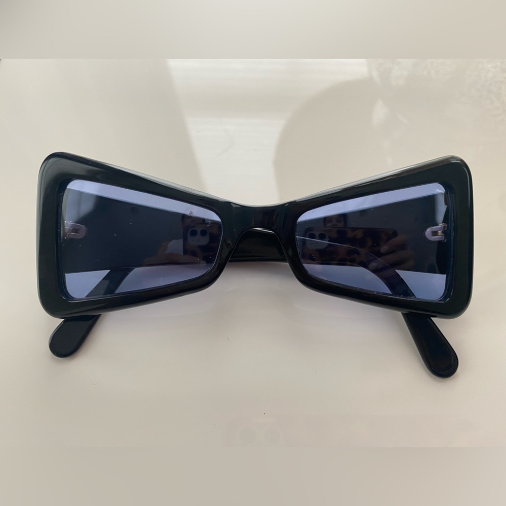 Chanel vintage sunglasses. Never worn. Shiny black with blue lenses. Gold CC